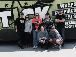 Stick Team standing in front of Stick Trailer